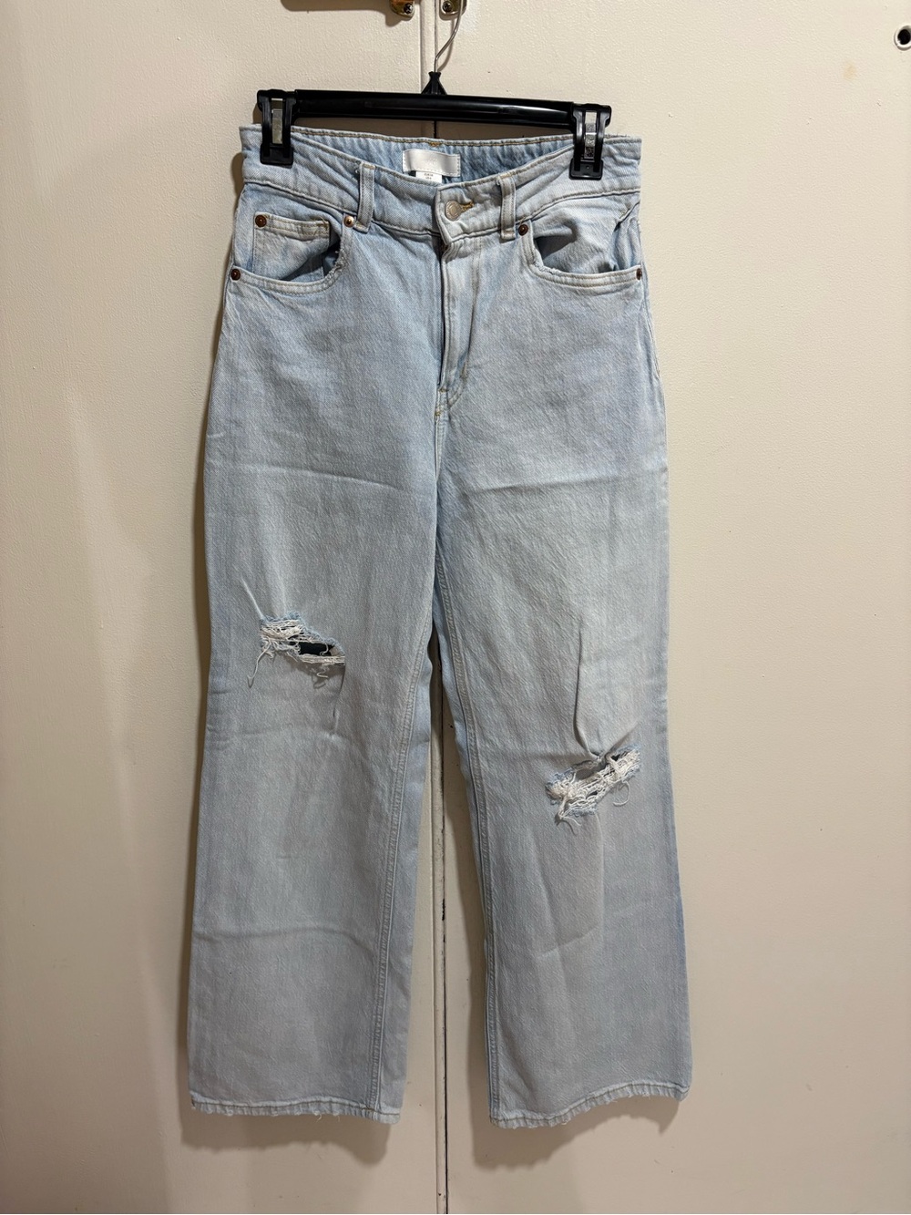 H &M light wash ripped high rise fit jeans
